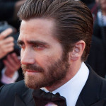 Jake Gyllenhaal with Brushed Back Hair and a Full Beard.
